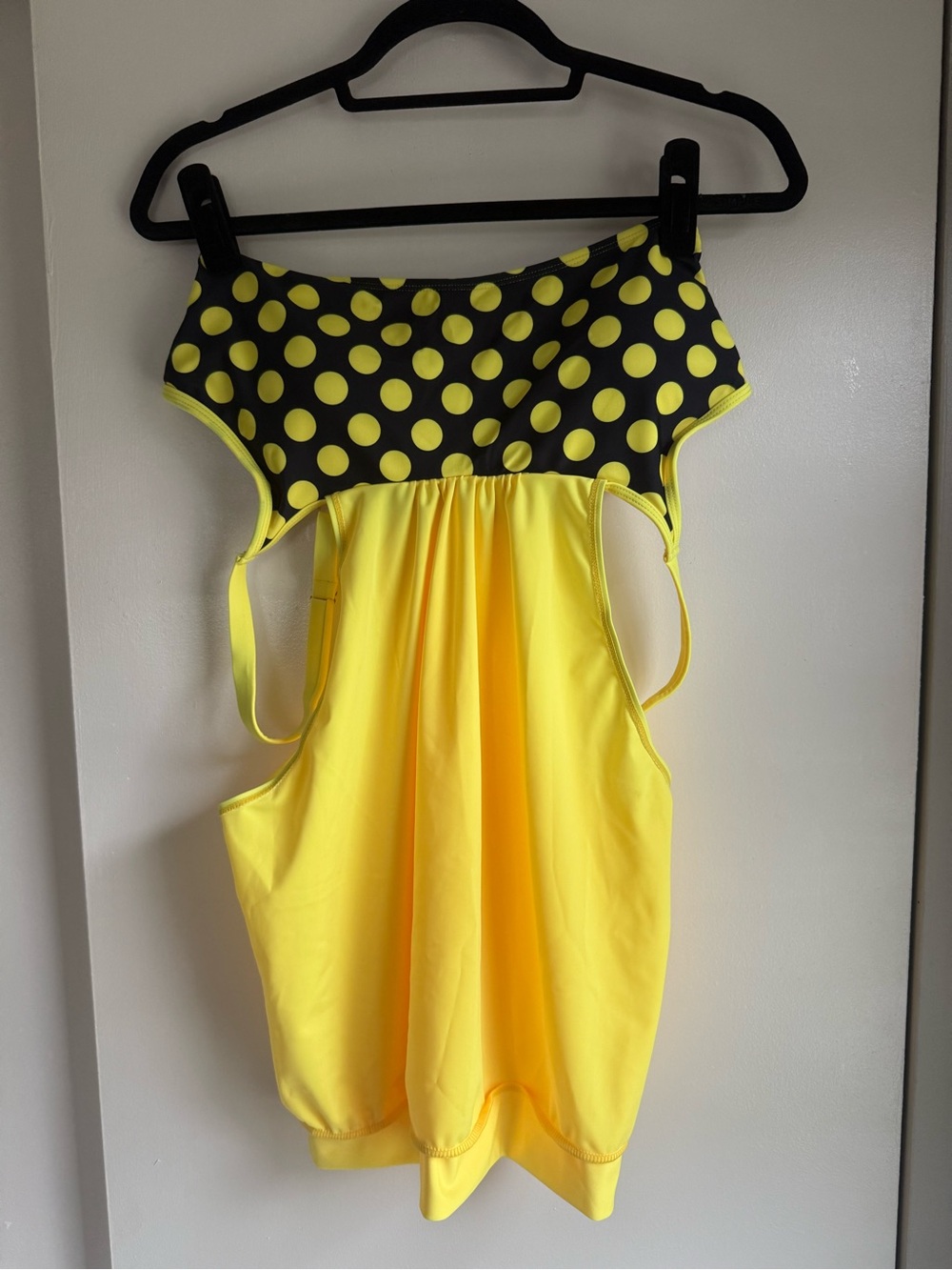 Yellow Polka Dot swimming top with straps on the side